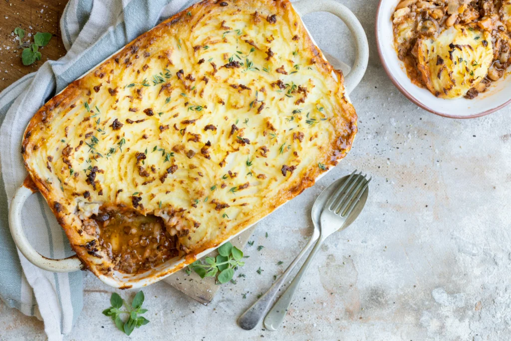Cheesy beef and potato pie with mashed potatoes and melted mozzarella and cheddar