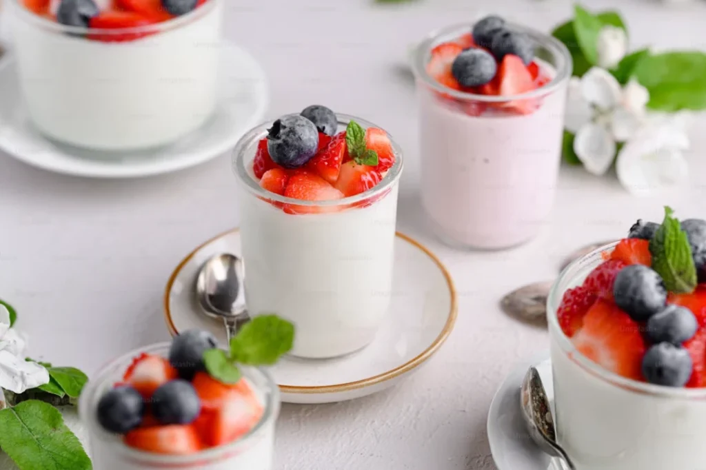Greek yogurt berry parfait with strawberries blueberries oats and almonds