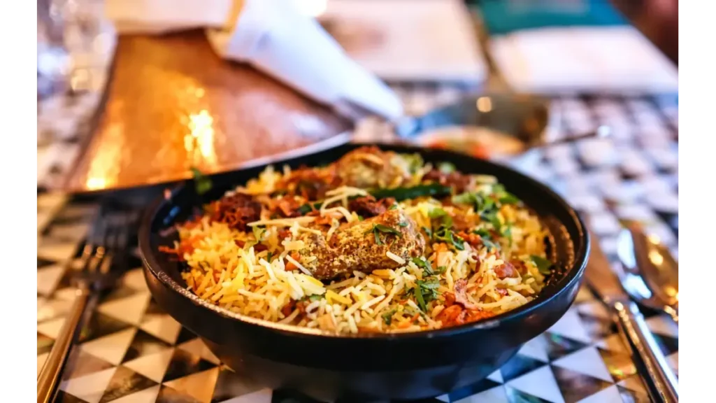 Chicken, beef and shrimp rice with basmati rice, tomatoes, green peppers and parsley.