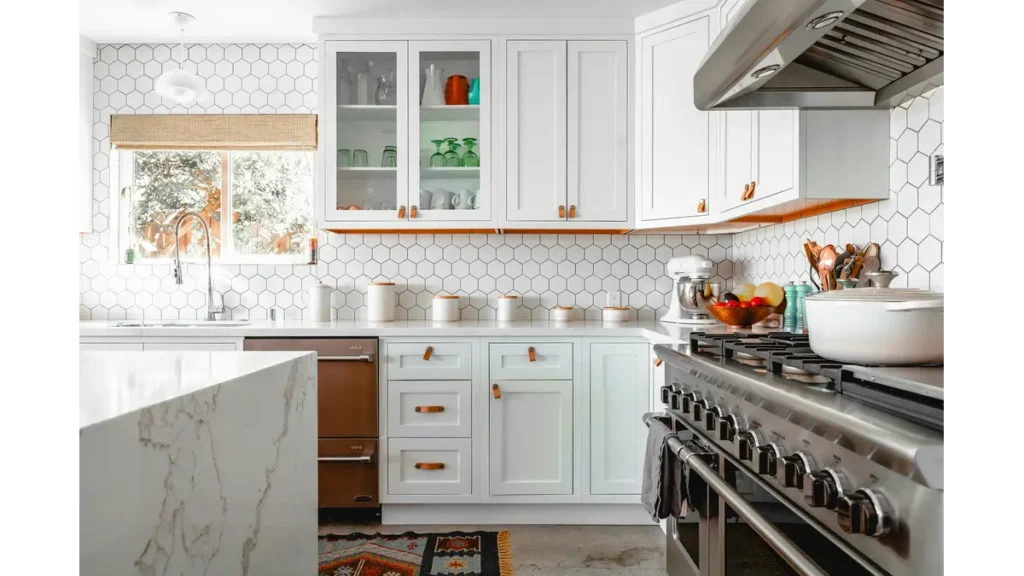 Tidy budget kitchen with matching glass jars and clear counters